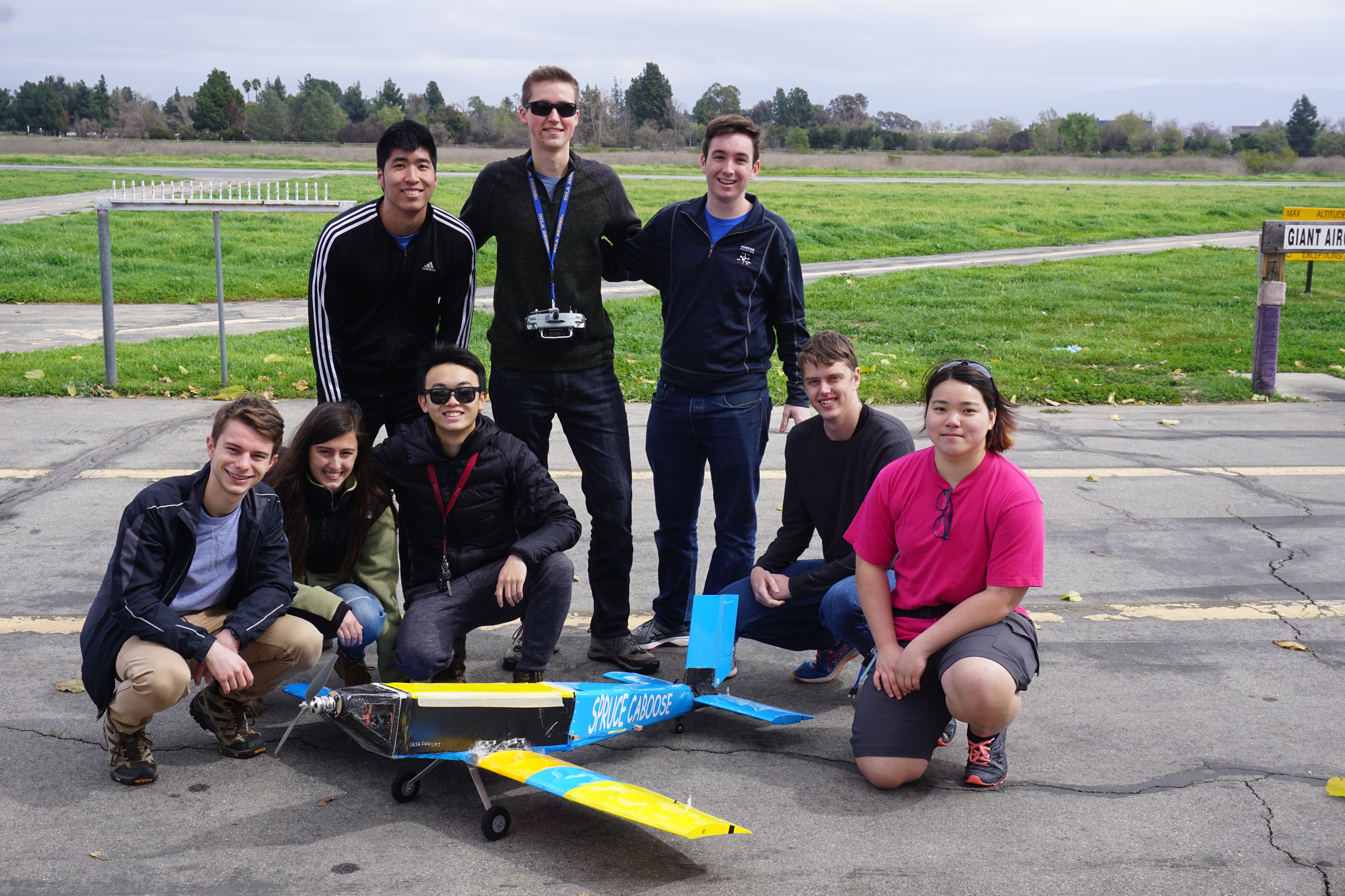 DBF Members in front of plane
